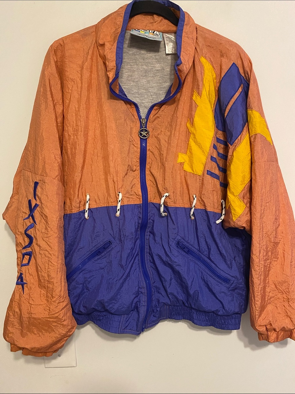 jamie sadock Orange and Aqua Color-Accent Jacket Label, has some thickness